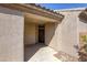 Front entrance with stucco walls offering covered entry from the elements at 4124 Gliding Gulls Ave, North Las Vegas, NV 89084