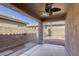 Covered patio perfect for outdoor entertaining with ceiling fan and access to landscaped backyard, offers a relaxing retreat at 4124 Gliding Gulls Ave, North Las Vegas, NV 89084
