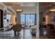 Modern condo kitchen with stainless steel appliances and sleek finishes, open to living area with city views at 4381 W Flamingo Rd # 3818, Las Vegas, NV 89103