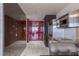 Modern kitchen showcasing stainless steel appliances, sleek cabinetry, and elegant marble tile flooring at 4381 W Flamingo Rd # 3818, Las Vegas, NV 89103