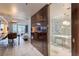 Modern condo featuring stainless steel appliances, a living area, and a bathroom with glass shower at 4381 W Flamingo Rd # 3818, Las Vegas, NV 89103