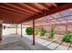 Cozy backyard area with lattice covered patio, providing shade and a private outdoor space at 5242 Dickens Dr, Las Vegas, NV 89119