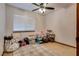 Cluttered bedroom with area rug and blinds at 5242 Dickens Dr, Las Vegas, NV 89119