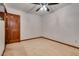 Spacious bedroom with neutral carpet and trim details at 5242 Dickens Dr, Las Vegas, NV 89119