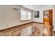 Bright living room with wood floors and lots of sunlight, offering a warm and welcoming space at 5242 Dickens Dr, Las Vegas, NV 89119