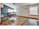 Bright home office with a desk and ample natural light from large windows, creating a workspace at 5242 Dickens Dr, Las Vegas, NV 89119