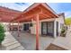 Backyard patio covered with pergola with outdoor dining at 5242 Dickens Dr, Las Vegas, NV 89119