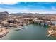 Scenic aerial view of the Lake Las Vegas community with lake, mountains, and the village at 53 Falling Ridge Ln, Henderson, NV 89011