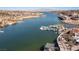 Panoramic aerial view of Lake Las Vegas featuring lake, homes, and golf course at 53 Falling Ridge Ln, Henderson, NV 89011