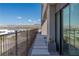 Spacious balcony provides amazing views of the lake and mountains with iron railings at 53 Falling Ridge Ln, Henderson, NV 89011
