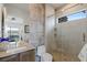 Modern bathroom with tiled walk-in shower and stylish vanity at 53 Falling Ridge Ln, Henderson, NV 89011