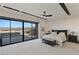 Spacious bedroom with sliding glass doors leading to outdoor area and beautiful views at 53 Falling Ridge Ln, Henderson, NV 89011