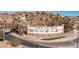 Lake Las Vegas community sign featuring palm trees, landscaping, and nearby amenities at 53 Falling Ridge Ln, Henderson, NV 89011