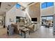 Bright and open living room features fireplace, high ceilings, many windows and lots of natural light at 53 Falling Ridge Ln, Henderson, NV 89011