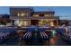 Luxurious pool featuring modern lounge chairs and fire bowls, offering a perfect space for relaxation and entertaining at 53 Falling Ridge Ln, Henderson, NV 89011
