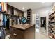 Organized walk-in closet featuring custom storage and plenty of space at 53 Falling Ridge Ln, Henderson, NV 89011