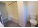 Bathroom with tiled shower-tub combo and modern toilet at 5817 Bonita Rose St, Las Vegas, NV 89113