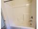 Shower and bathtub combination with bright white walls at 5817 Bonita Rose St, Las Vegas, NV 89113