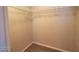 Organized walk-in closet with multiple shelves at 5817 Bonita Rose St, Las Vegas, NV 89113