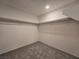 Walk-in closet features carpeted floors and rods at 5817 Bonita Rose St, Las Vegas, NV 89113