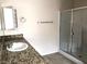 Bathroom featuring granite counters, single sink, and a glass enclosed shower at 6168 Scarlet Leaf St, Las Vegas, NV 89148