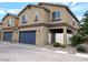 Charming two-story townhome with a private gated front patio and a convenient two-car garage at 6168 Scarlet Leaf St, Las Vegas, NV 89148