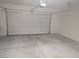 Spacious two-car garage with ample room for parking and storage at 6168 Scarlet Leaf St, Las Vegas, NV 89148