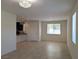 Open-concept living space featuring tile floors and abundant natural light at 6168 Scarlet Leaf St, Las Vegas, NV 89148