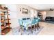 Lovely dining area with ample natural light, seating for six, and stylish decor at 6650 Drusilla St, North Las Vegas, NV 89084