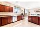A spacious kitchen with granite countertops, stainless steel appliances, and plenty of cabinet space at 6650 Drusilla St, North Las Vegas, NV 89084
