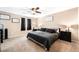 Bedroom featuring a ceiling fan, cozy carpeting, and coordinated decor at 6650 Drusilla St, North Las Vegas, NV 89084