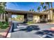 Community entrance with gatehouse, providing security and a welcoming first impression for residents and visitors at 7119 S Durango Dr # 303, Las Vegas, NV 89113