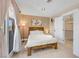 Comfortable bedroom with natural light and view to an outdoor area at 7470 Eldora Av, Las Vegas, NV 89117