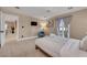 Bright bedroom with plush carpeting, neutral walls, and natural light at 7470 Eldora Av, Las Vegas, NV 89117