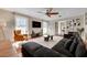Inviting living room with a comfortable sectional sofa, stylish rug, and a serene atmosphere at 7470 Eldora Av, Las Vegas, NV 89117