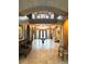 Elegant foyer featuring high ceilings, wrought iron accents, and arched doorways leading to other areas of the home at 7625 Coley Ave, Las Vegas, NV 89117