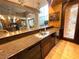 Entertainer's kitchen with granite counters, custom cabinets and wine and beverage fridges at 7625 Coley Ave, Las Vegas, NV 89117