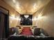 Home theater room with custom lighting, comfortable seating, and ornate ceiling at 7625 Coley Ave, Las Vegas, NV 89117