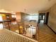 Spacious loft with ornate railing overlooking the entry and formal living room at 7625 Coley Ave, Las Vegas, NV 89117