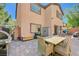 Paver patio features an outdoor dining area, grill, and convenient storage shed at 7651 Anatolian St, Las Vegas, NV 89166