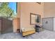Fenced backyard features a storage shed, room to grill, and a walking gate at 7651 Anatolian St, Las Vegas, NV 89166