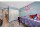 Bedroom showcasing a closet and wood-like floors at 7651 Anatolian St, Las Vegas, NV 89166