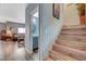 Hallway with decorative hardwood flooring and nearby half-bathroom at 7651 Anatolian St, Las Vegas, NV 89166