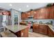 Well-equipped kitchen featuring granite countertops, stainless steel appliances, and generous cabinet space at 7651 Anatolian St, Las Vegas, NV 89166