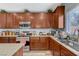 Updated kitchen showcasing modern appliances, a stainless steel sink, and ample counter space at 7651 Anatolian St, Las Vegas, NV 89166