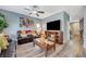Comfortable living room showing hardwood flooring and artwork at 7651 Anatolian St, Las Vegas, NV 89166