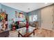 Bright living room with a view to the outside through window blinds at 7651 Anatolian St, Las Vegas, NV 89166