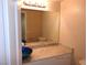Stylish bathroom with a unique vessel sink, decorative mirror, and modern fixtures at 7840 Millhopper Ave, Las Vegas, NV 89128