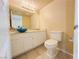 Bathroom featuring a unique bowl sink, neutral tile, and ample lighting for a spa-like feel at 7840 Millhopper Ave, Las Vegas, NV 89128