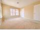 Bedroom featuring neutral walls, carpet flooring, and a window at 7840 Millhopper Ave, Las Vegas, NV 89128